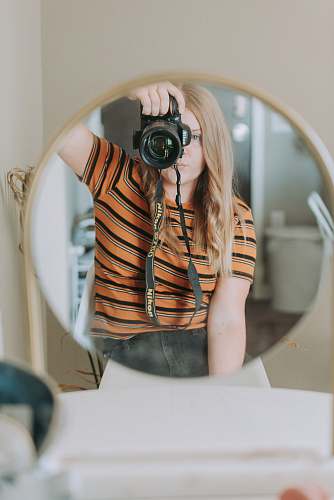 apple valley woman taking photo using black camera goggles